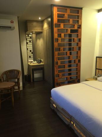 Imagen de la habitación del Hotel The Oikos. Foto 15