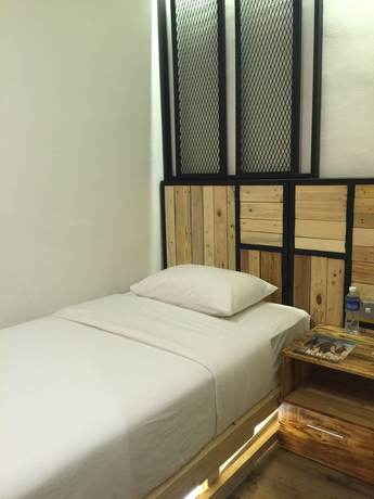 Imagen de la habitación del Hotel The Oikos. Foto 18
