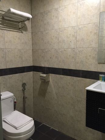 Imagen de la habitación del Hotel The Oikos. Foto 19