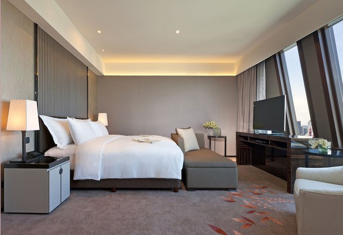 Imagen de la habitación del Hotel The Okura Prestige Bangkok. Foto 6