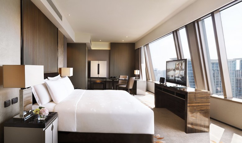 Imagen de la habitación del Hotel The Okura Prestige Bangkok. Foto 11