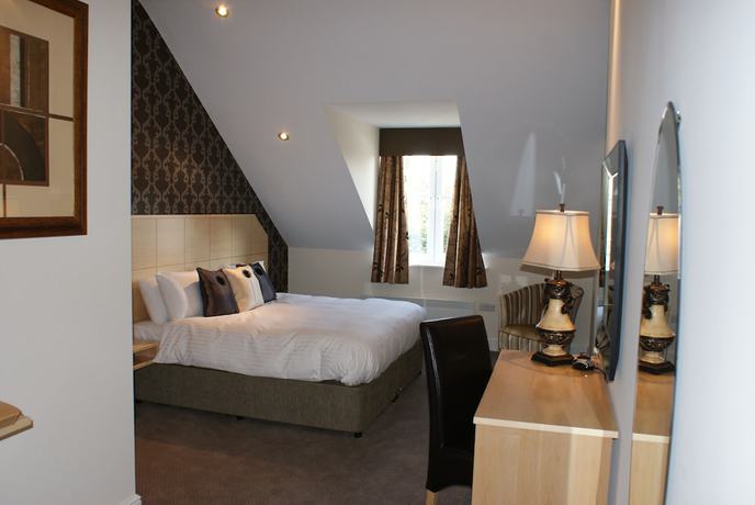 Imagen de la habitación del Hotel The Old Barn Inn. Foto 5