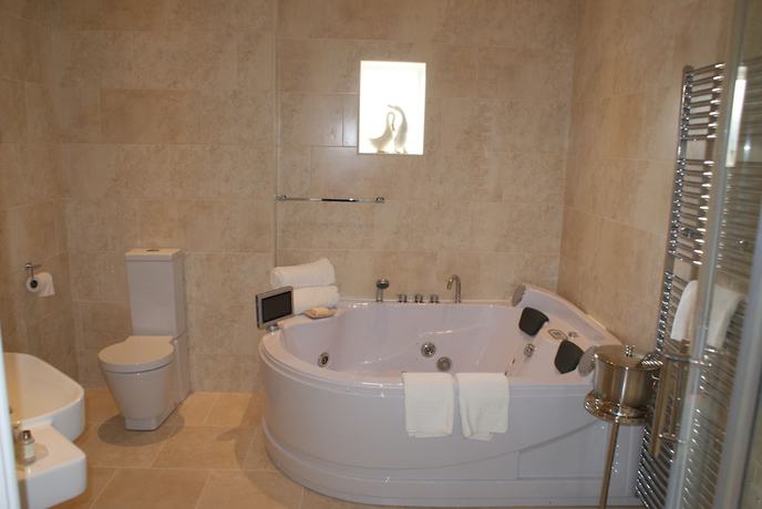 Imagen de la habitación del Hotel The Old Barn Inn. Foto 6
