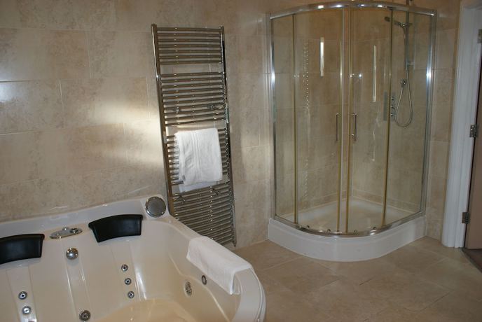 Imagen de la habitación del Hotel The Old Barn Inn. Foto 10