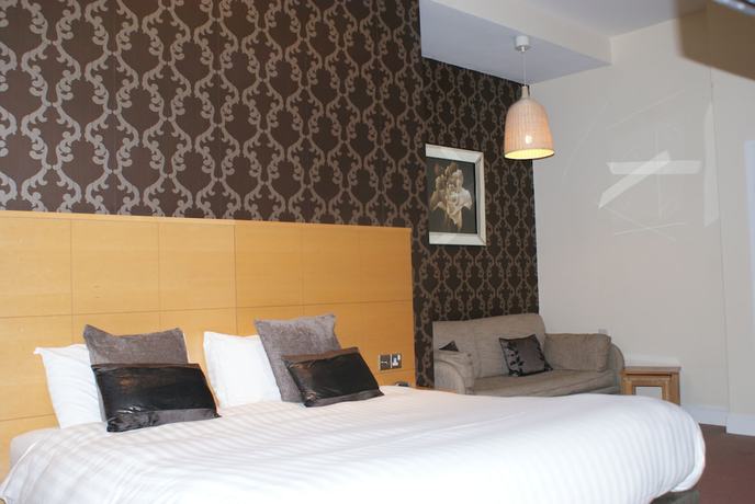 Imagen de la habitación del Hotel The Old Barn Inn. Foto 11