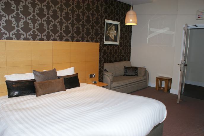Imagen de la habitación del Hotel The Old Barn Inn. Foto 13