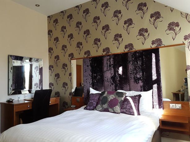 Imagen de la habitación del Hotel The Old Barn Inn. Foto 15