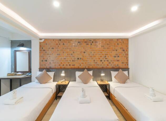 Imagen de la habitación del Hotel The Old City Wall Inn. Foto 17