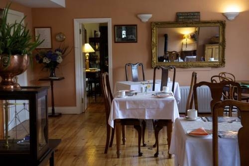 Imagen del bar/restaurante del Hotel The Old Coach House. Foto 5