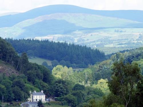 Imagen del bar/restaurante del Hotel The Old Coach House. Foto 7