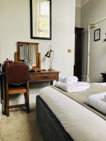Imagen de la habitación del Hotel The Old Coffee Tavern. Foto 3