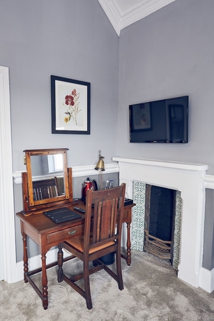 Imagen de la habitación del Hotel The Old Coffee Tavern. Foto 11