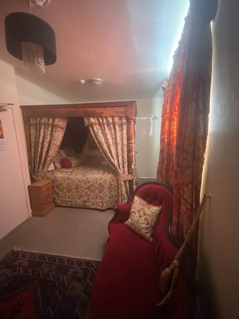 Imagen de la habitación del Hotel The Old Court. Foto 12