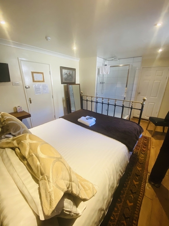 Imagen de la habitación del Hotel The Old Court. Foto 17