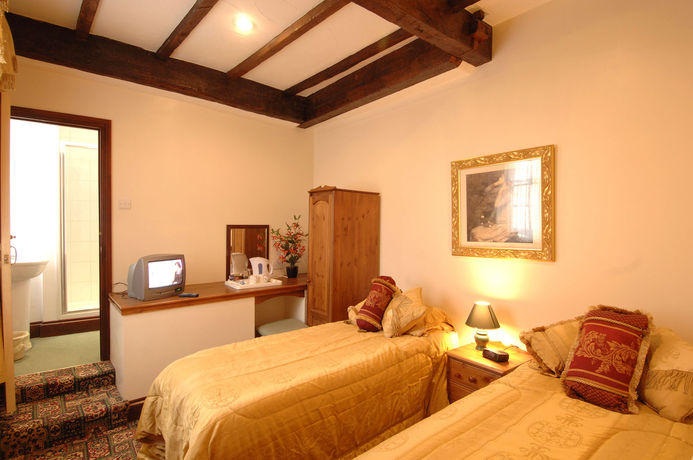 Imagen de la habitación del Hotel The Old Crown Coaching Inn. Foto 11