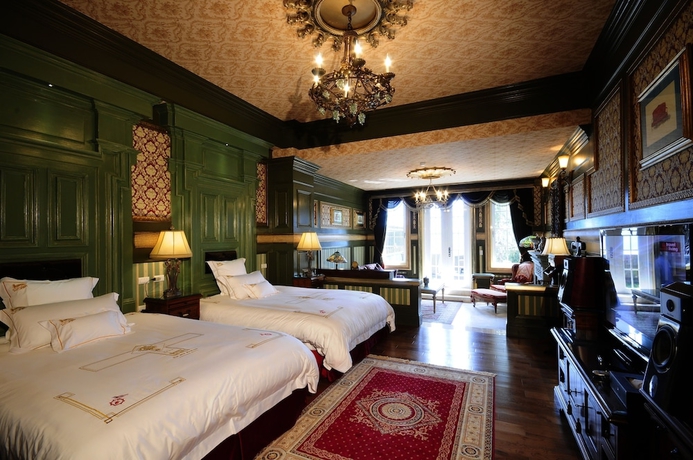 Imagen de la habitación del Hotel The Old England Manor. Foto 2