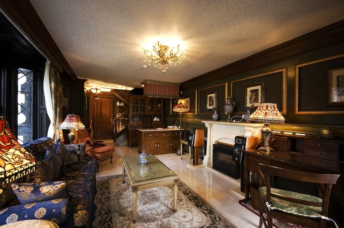 Imagen de la habitación del Hotel The Old England Manor. Foto 18