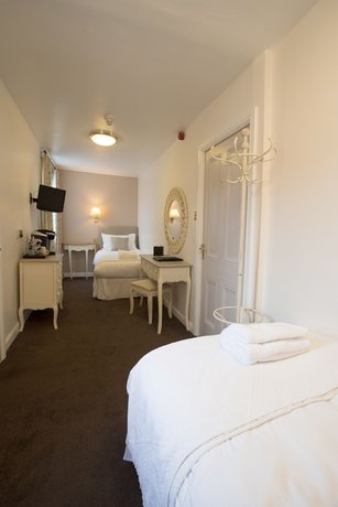 Imagen de la habitación del Hotel The Old Fourpenny Shop. Foto 9