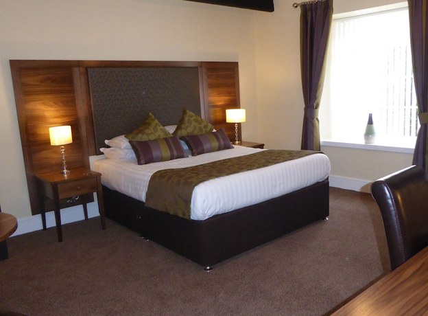 Imagen de la habitación del Hotel The Old Ginn House Inn. Foto 12