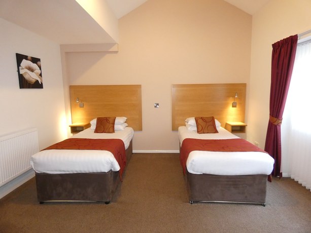 Imagen de la habitación del Hotel The Old Ginn House Inn. Foto 15