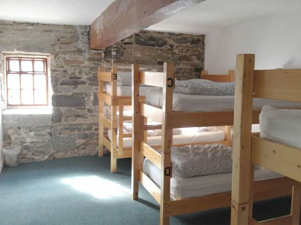 Imagen de la habitación del Hotel The Old Mill Holiday Hostel. Foto 8