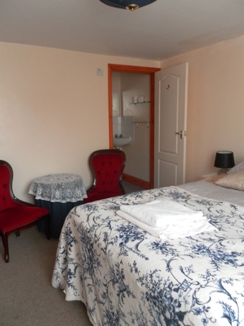 Imagen de la habitación del Hotel The Old Palace Guest House. Foto 5