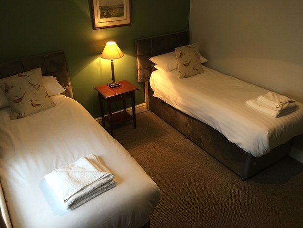 Imagen de la habitación del Hotel The Old Pheasant. Foto 16