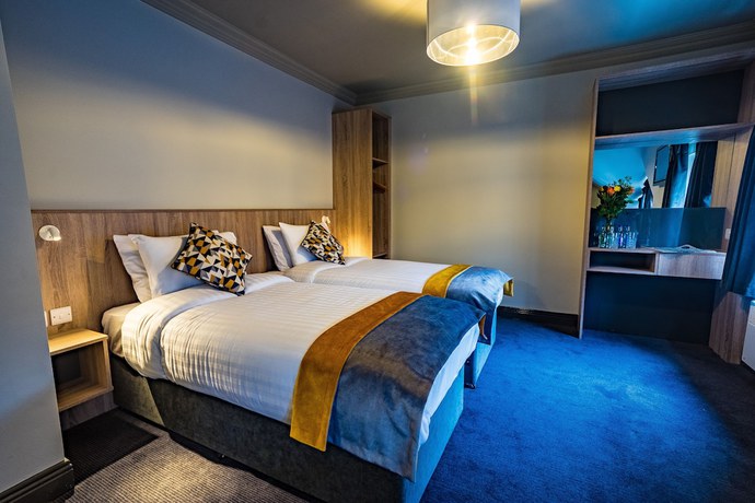 Imagen de la habitación del Hotel The Old Quarter Townhouse. Foto 5