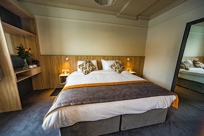 Imagen de la habitación del Hotel The Old Quarter Townhouse. Foto 6