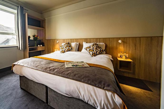 Imagen de la habitación del Hotel The Old Quarter Townhouse. Foto 7