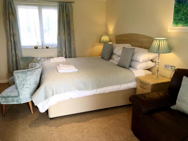 Imagen de la habitación del Hotel The Old Quay House. Foto 10