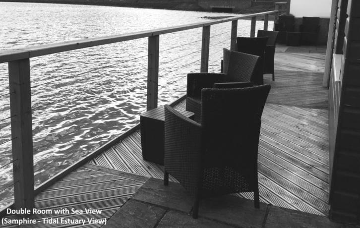 Imagen de la habitación del Hotel The Old Quay House. Foto 13