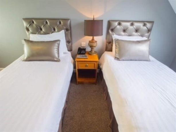 Imagen de la habitación del Hotel The Old Red Lion Inn. Foto 17