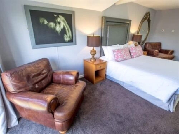 Imagen de la habitación del Hotel The Old Red Lion Inn. Foto 18