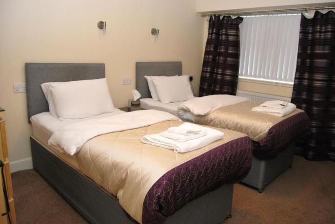 Imagen de la habitación del Hotel The Old School Guest House. Foto 6