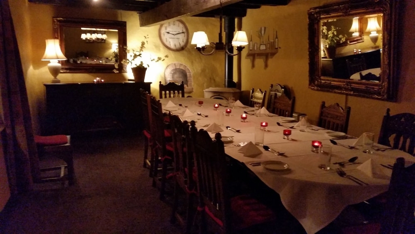 Imagen del bar/restaurante del Hotel The Old Well Inn. Foto 5