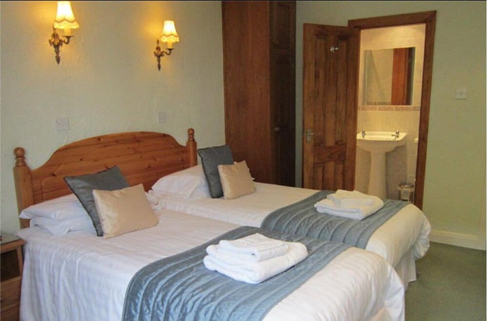 Imagen de la habitación del Hotel The Old White Lion. Foto 7