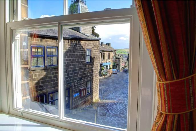 Imagen de la habitación del Hotel The Old White Lion. Foto 10