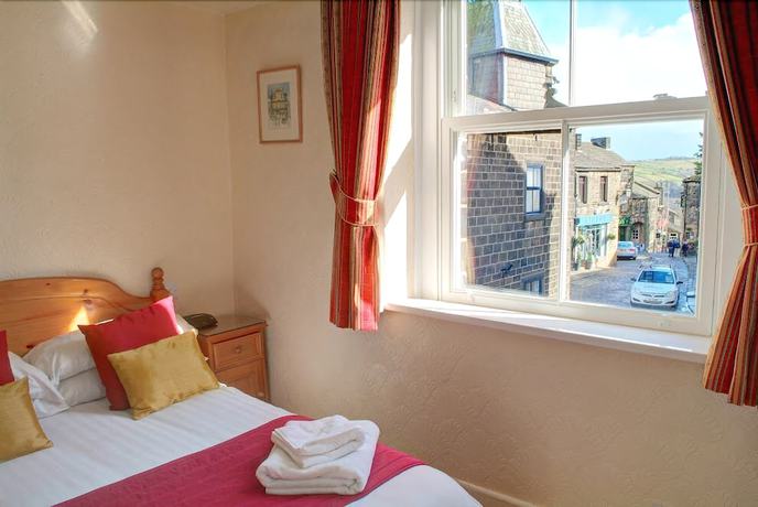 Imagen de la habitación del Hotel The Old White Lion. Foto 11