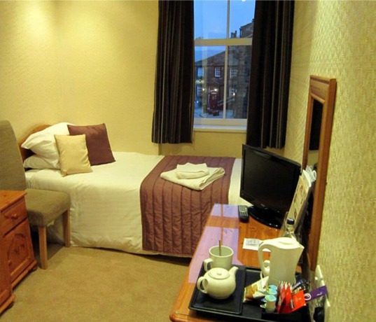 Imagen de la habitación del Hotel The Old White Lion. Foto 15