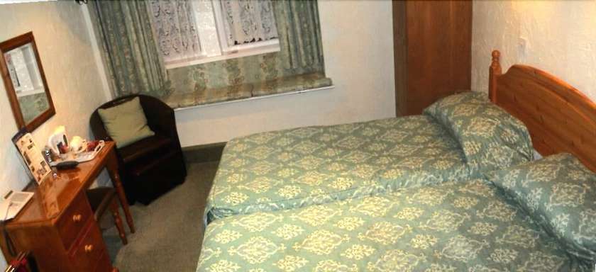 Imagen de la habitación del Hotel The Old White Lion. Foto 16