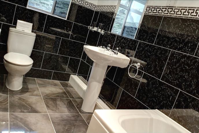 Imagen de la habitación del Hotel The Old White Lion. Foto 17