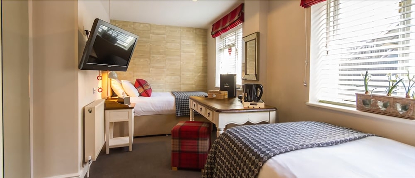 Imagen de la habitación del Hotel The Olde Coach House. Foto 4
