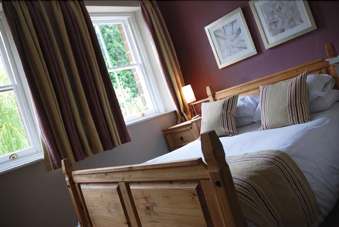 Imagen de la habitación del Hotel The Olde Coach House. Foto 9