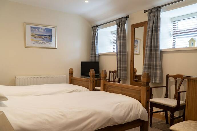 Imagen de la habitación del Hotel The Olde Ship Inn. Foto 12