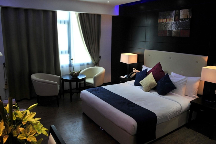 Imagen de la habitación del Hotel The Olive. Foto 6