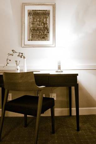 Imagen de la habitación del Hotel The Oliver. Foto 6
