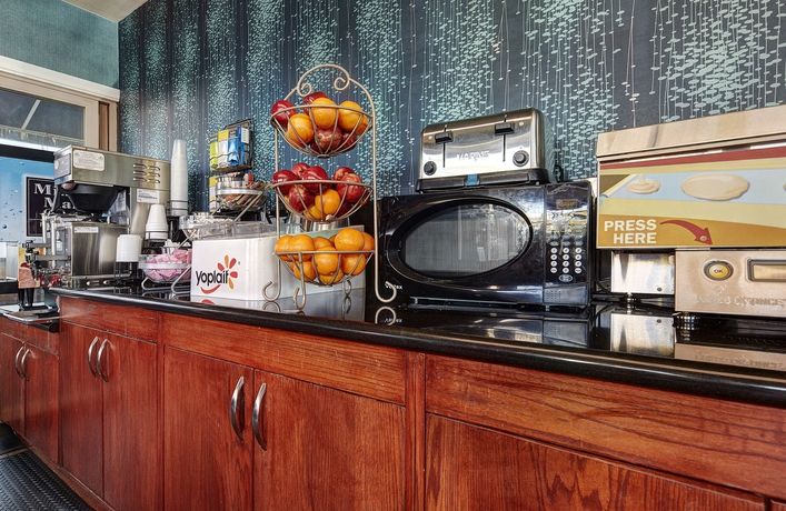 Imagen del bar/restaurante del Hotel The Olivia. Foto 2