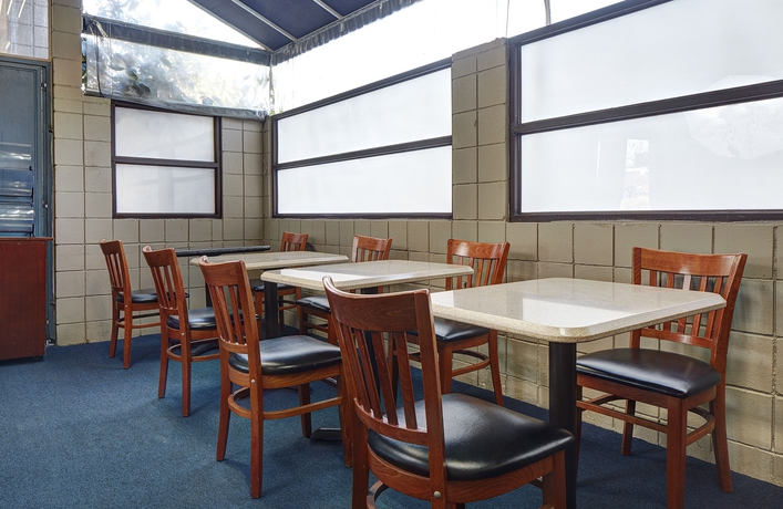 Imagen del bar/restaurante del Hotel The Olivia. Foto 3