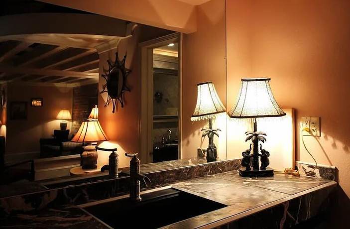 Imagen de la habitación del Hotel The Olivier House. Foto 18